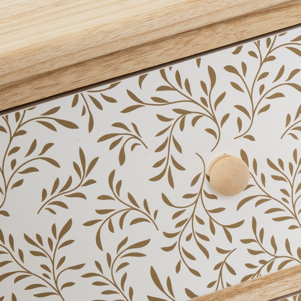 Mesita de noche con cajones tapizados