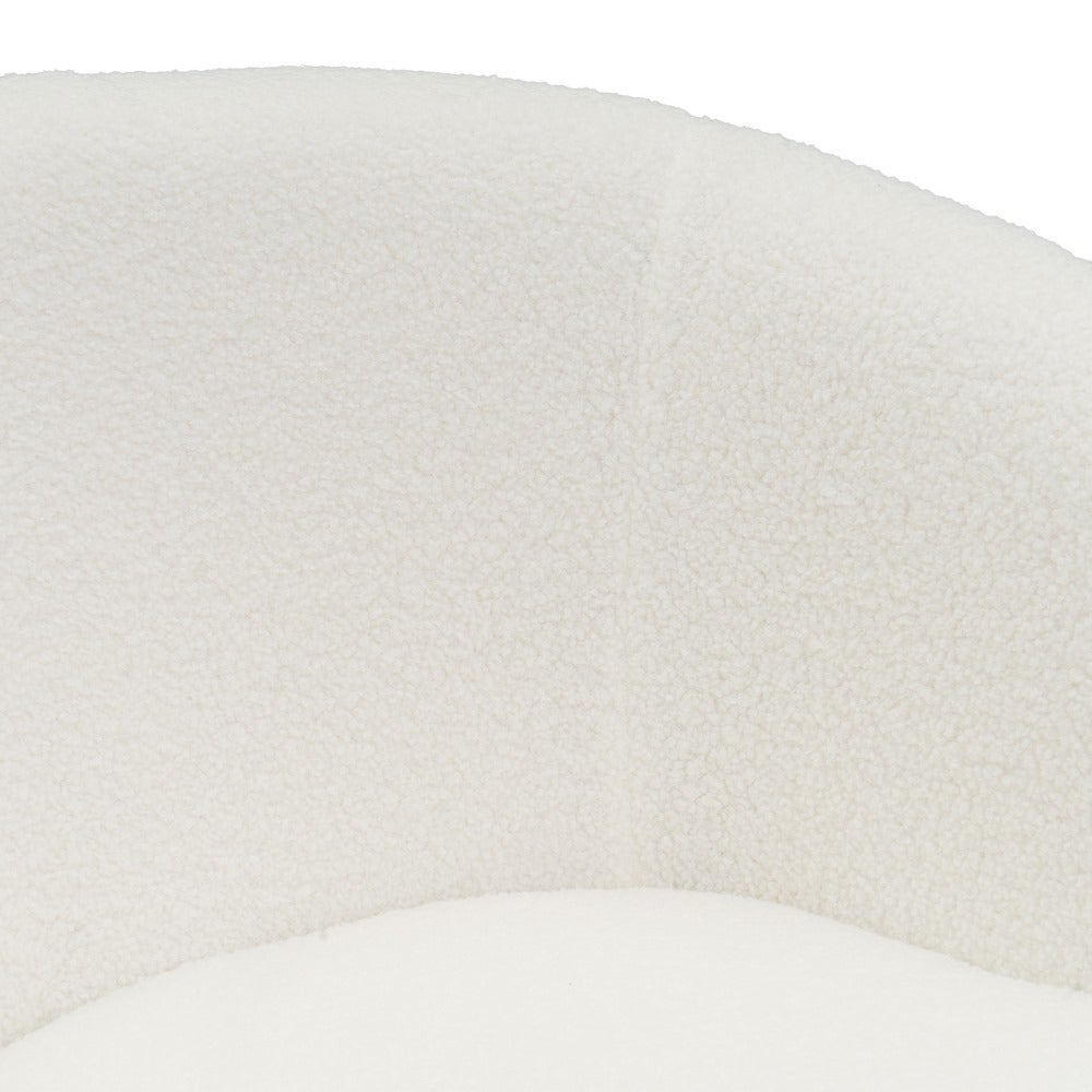 Sillón butaca redondo con brazos blanco de tela de borreguito