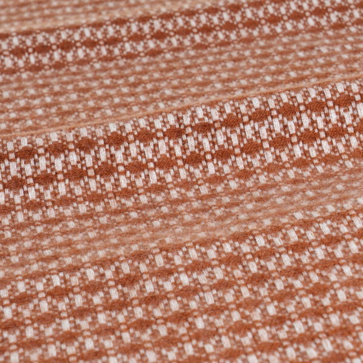 Manta terracota de 130x160 cm con flecos