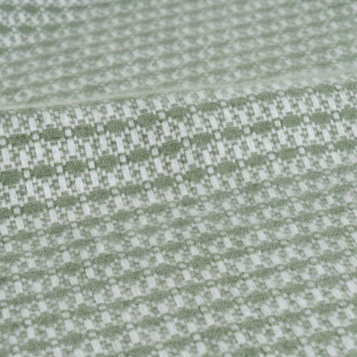 Manta de poliéster verde de 130x160 cm con flecos 200 gr/m2