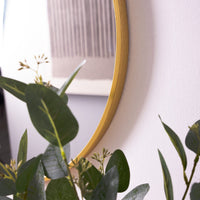 Espejo de pared redondo dorado de 60 cm