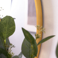 Espejo de pared redondo dorado de 120 cm