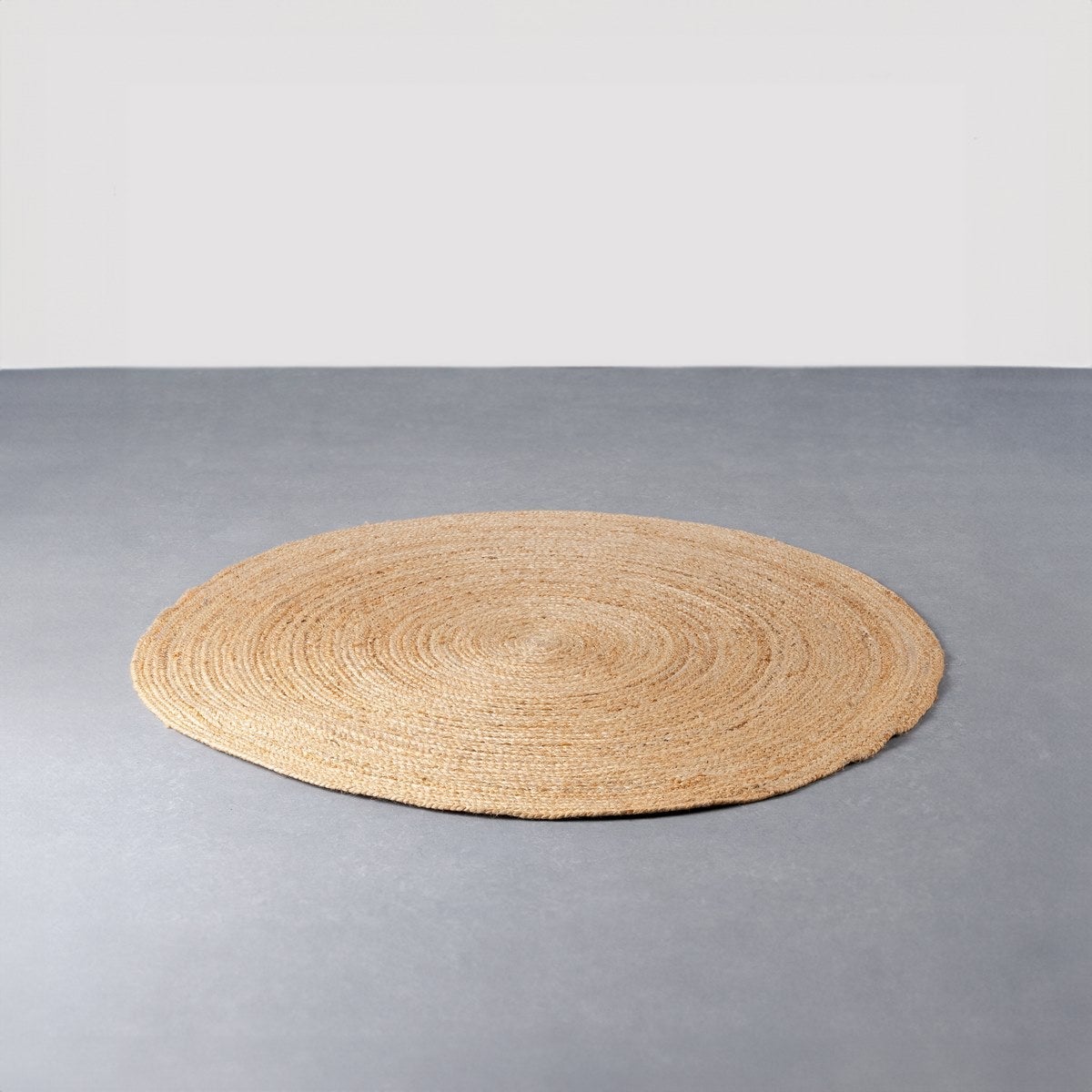 Alfombra redonda trenzada de yute natural doble costura de 90 cm