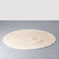 Alfombra redonda trenzada de yute blanca y natural de Ø 100 cm