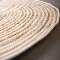 Alfombra redonda trenzada de yute blanca y natural de Ø 100 cm