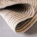 Alfombra redonda trenzada de yute blanca y natural de Ø 100 cm