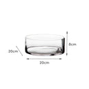 Jarrón cilíndrico transparente.