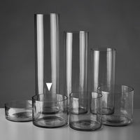 Jarrón cilíndrico de vidrio transparente