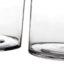 Jarrón cilíndrico transparente.