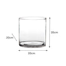 Jarrón cilíndrico transparente.