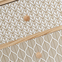 Mesita de noche con cajones tapizados