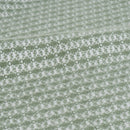 Manta verde de 130x160 cm con flecos