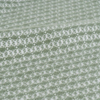 Manta verde de 130x160 cm con flecos