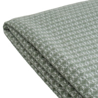 Manta verde de 130x160 cm con flecos