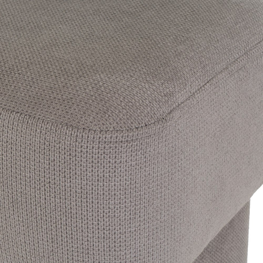 Puff cuadrado tapizado en tela gris