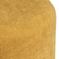 Puff redondo tapizado en tela amarillo mostaza