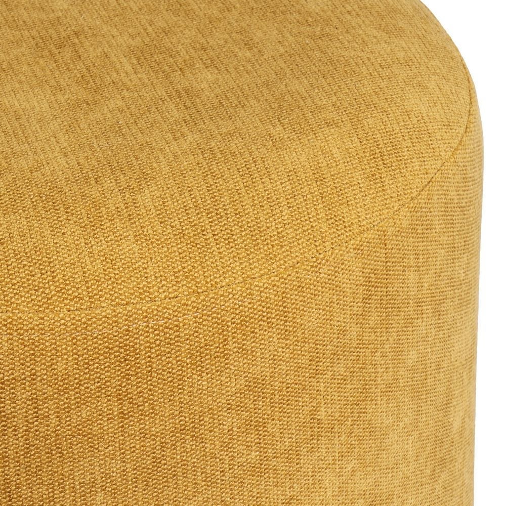 Puff redondo tapizado en tela amarillo mostaza