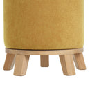 Puff redondo tapizado en tela amarillo mostaza