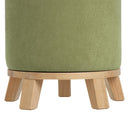 Puff redondo tapizado en tela verde