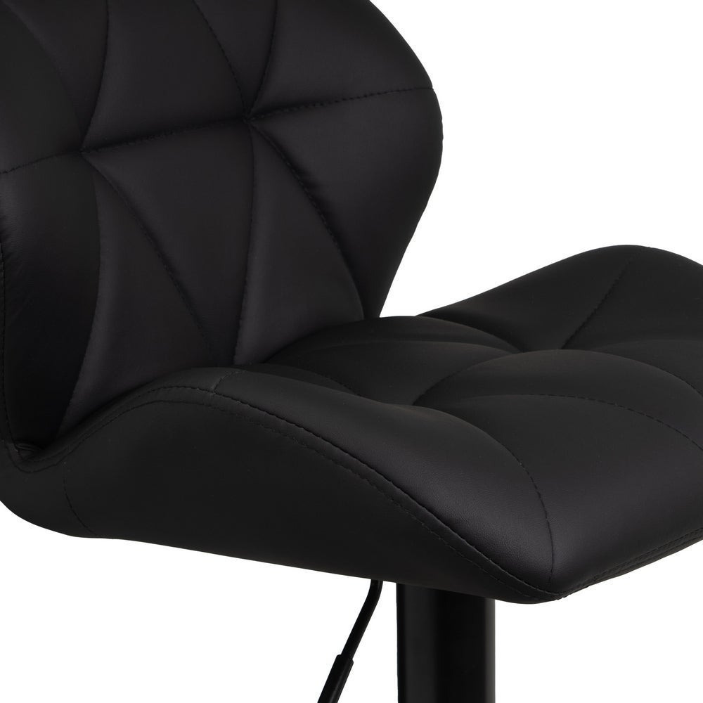 Taburete de piel natural negro giratorio y elevable